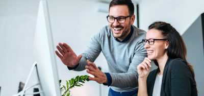 Two employees having an animated discussion